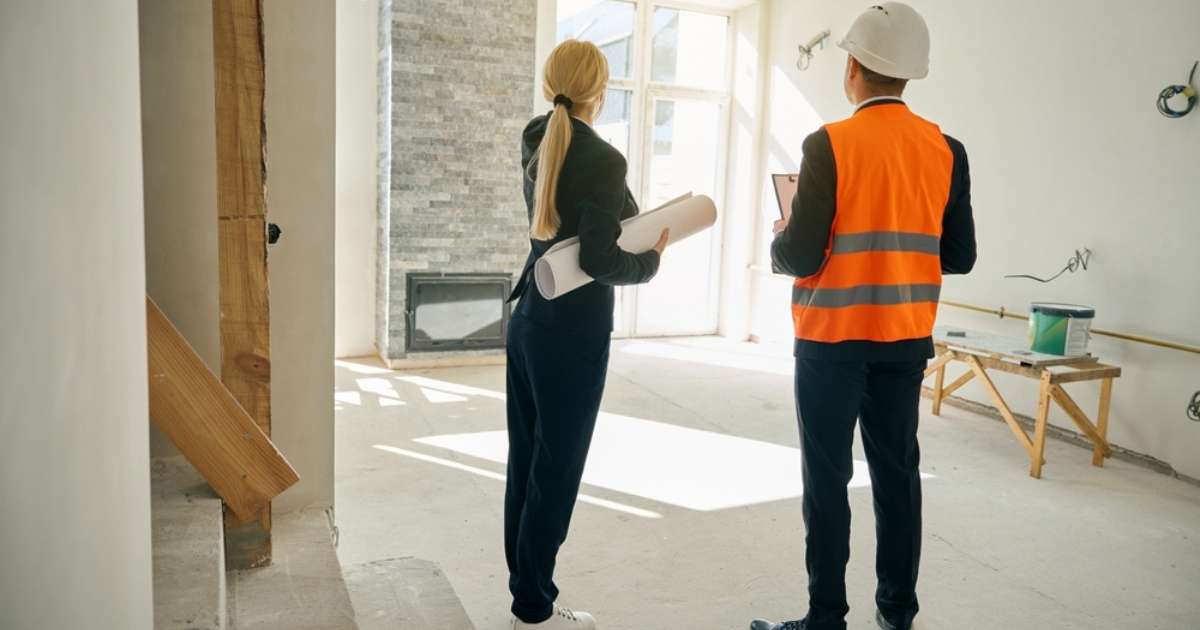 A home inspector and a client inspecting a Minnesota home for sale